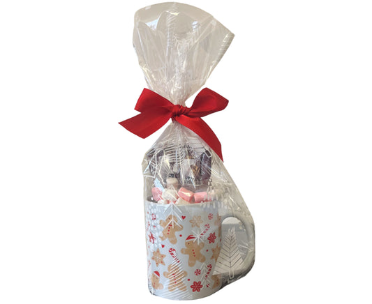 Gift mug with a red ribbon and gringerbread design on a white background