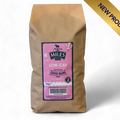 A 1kg bag of Miles Low-Caf Hand Roasted Coffee Beans in a brown kraft paper bag with a pink label, shown on a white background with a gold diagonal 'NEW PRODUCT' banner in the top right corner.