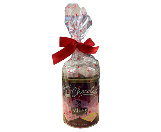Tub of Miles hot chocolate with a red ribbon on a white background